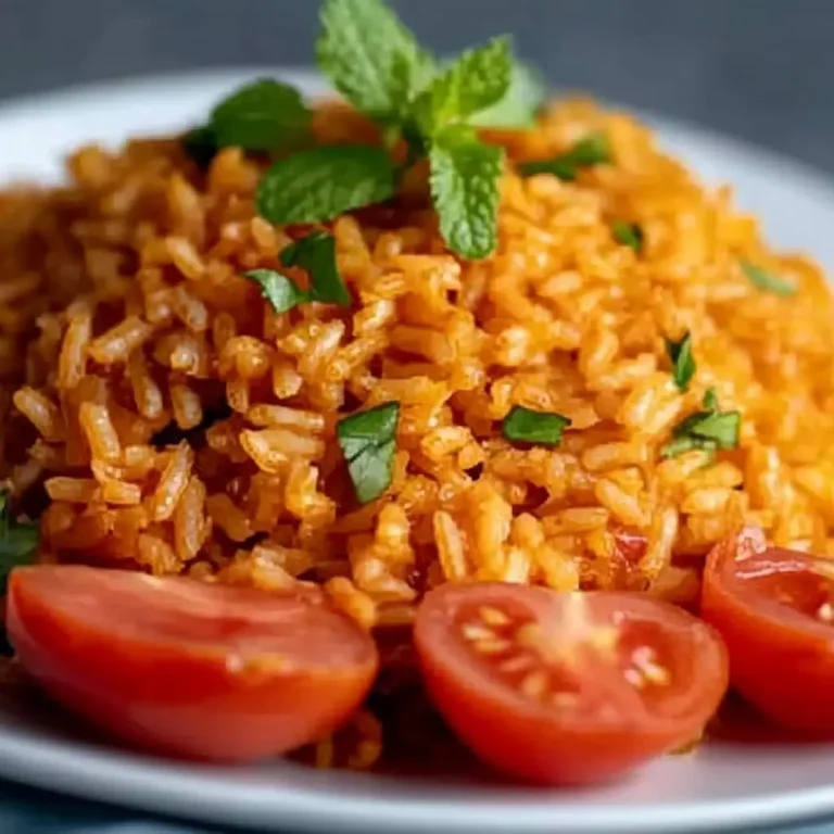 Easy recipe for bulgur pilaf with tomatoes and parsley on a white plate